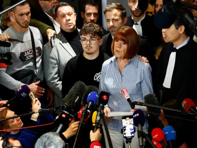 Frenchwoman Gisele Pelicot, the victim of an alleged mass rape orchestrated by her then-husband Dominique Pelicot at their home in the southern French town of Mazan, talks to journalists after the verdict in the trial for Dominique Pelicot and 50 co-accused, at the courthouse in Avignon, France, December 19, 2024. REUTERS/Manon Cruz