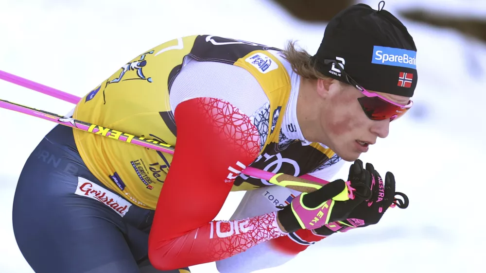 Johannes Hoesflot Klaebo from Norway in action during the men's 15 km mass start classic at the Cross Country skiing world cup in Oberstdorf, Germany, Friday, Dec. 31, 2021. (Karl-Josef Hildenbrand/dpa via AP)