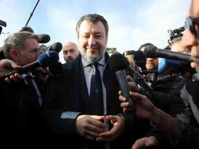 Italian Deputy Prime Minister Matteo Salvini speaks to media upon his arrival at Pagliarelli bunker courthouse for a hearing in the trial over his 2019 decision to prevent more than 100 migrants from landing in the country, in Palermo, Italy, December 20, 2024. REUTERS/Igor Petyx