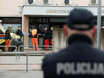 A police officer stands, following a knife attack in a primary school, in Zagreb, Croatia, December 20, 2024. REUTERS/Antonio Bronic