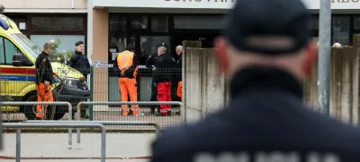 A police officer stands, following a knife attack in a primary school, in Zagreb, Croatia, December 20, 2024. REUTERS/Antonio Bronic