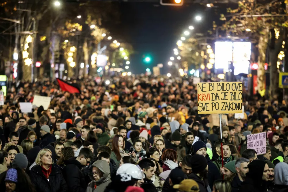 People attend a protest against government policies, corruption and the negligence which they blame for the deaths of the victims in the Novi Sad railway station disaster in November, in Belgrade, Serbia, December 22, 2024. REUTERS/Djordje Kojadinovic