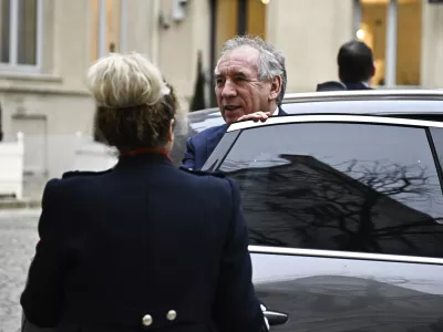 French Prime Minister Francois Bayrou arrives for a meeting at a crisis centre at the Interior Ministry in Paris, Monday Dec. 23, 2024, following the cyclone Chido's passage over the French Indian Ocean territory of Mayotte. French President Emmanuel Macron's office announced a new government Monday, after the previous Cabinet collapsed in a historic vote prompted by fighting over the country's budget. (Julien de Rosa, Pool via AP)