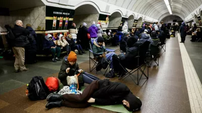 People take shelter at a metro station during an air raid alert, amid Russia's attack on Ukraine, in Kyiv, Ukraine, December 25, 2024. REUTERS/Thomas Peter