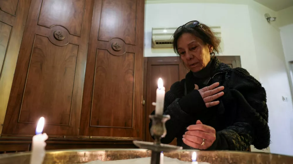 A faithful prays on the day of the Christmas morning Mass at the Lady of Damascus church, following the ousting of Syria's Bashar al-Assad, in Damascus, Syria, December 25, 2024. REUTERS/Amr Abdallah Dalsh