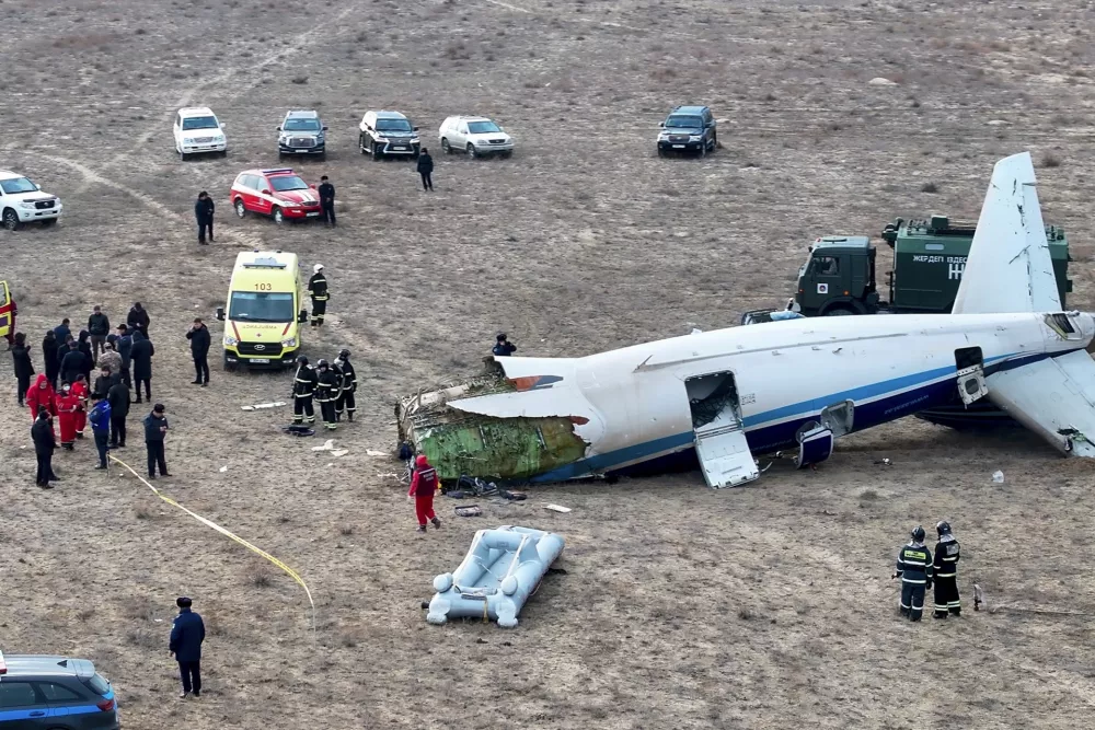 The wreckage of Azerbaijan Airlines Embraer 190 lays on the ground near the airport of Aktau, Kazakhstan, Wednesday, Dec. 25, 2024. (AP Photo/Azamat Sarsenbayev)