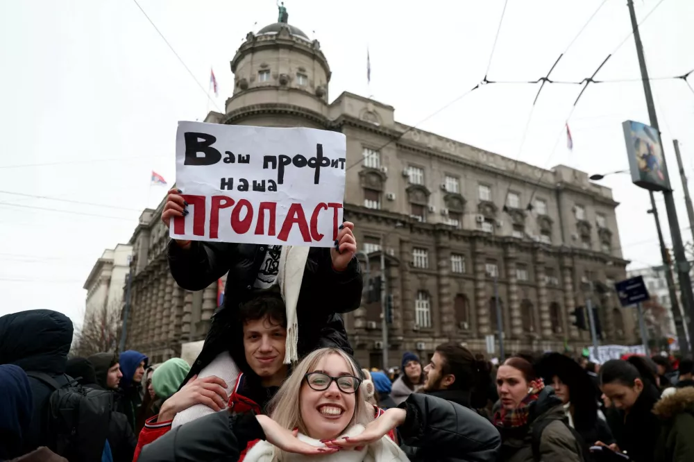 Students gather to deliver 1000 identical letters of complaint to chief state prosecutor Zagorka Dolovac to protest the slow investigation of a train station roof collapse last month in Novi Sad in which 15 people died, in Belgrade, Serbia, December 25, 2024. REUTERS/Zorana Jevtic