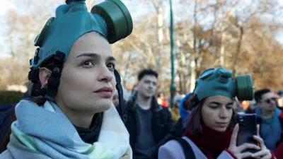 Women with gas masks protest to tackle air pollution in Skopje, North Macedonia December 28,2024.REUTERS/Ognen Teofilovski