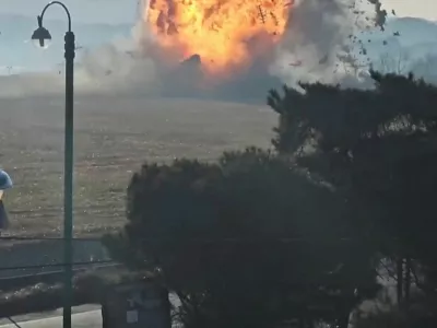 Jeju Air flight 7C2216 is engulfed in flames as it slams into a wall following a crash after landing at Muan International Airport in Muan, South Korea December 29, 2024 in this screengrab obtained from video. Lee Geun-young/via REUTERS THIS IMAGE HAS BEEN SUPPLIED BY A THIRD PARTY. MANDATORY CREDIT. NO RESALES. NO ARCHIVES.