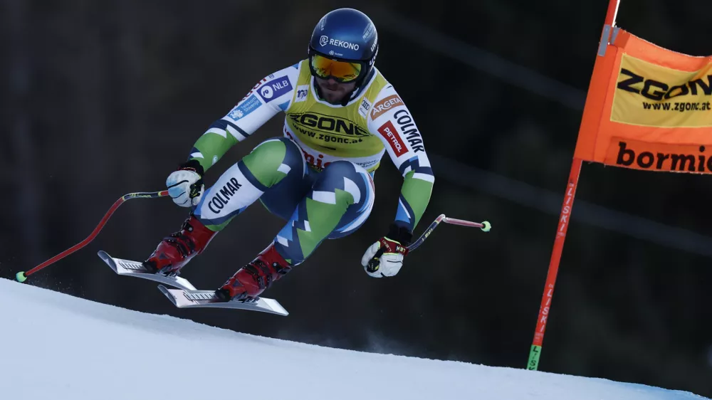 Slovenia's Miha Hrobat speeds down the course during an alpine ski, men's World Cup downhill race, in Bormio, Italy, Saturday, Dec. 28, 2024. (AP Photo/Gabriele Facciotti)