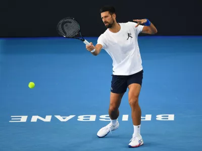 28 December 2024, Australia, Brisbane: Serbian tennis player Novak Djokovic takes part in a practice session prior to the Brisbane International at Queensland Tennis Centre in Brisbane. Photo: Jono Searle/AAP/dpa