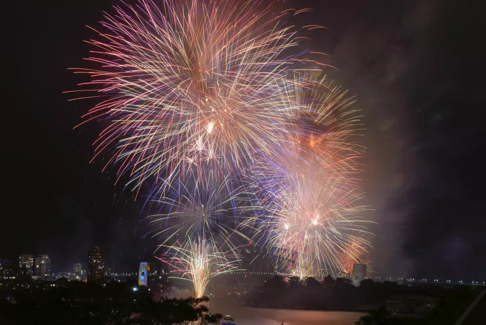 FILE - Fireworks explode over the Sydney Harbour Bridge as New Year celebrations begin in Sydney, Australia, Monday, Jan. 1, 2024. (AP Photo/Mark Baker, File)