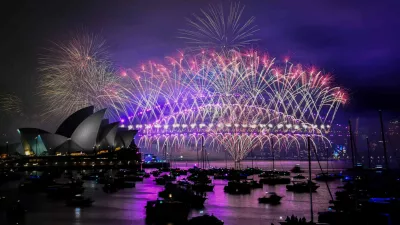 31 December 2024, Australia, Sydney: Fireworks illuminate the sky over the Opera House and the Harbour Bridge during New Year's Eve celebrations. Photo: Bianca De Marchi/AAP/dpa