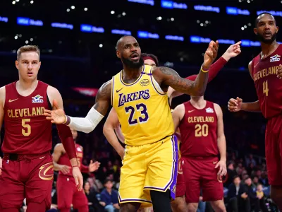 Dec 31, 2024; Los Angeles, California, USA; Los Angeles Lakers forward LeBron James (23) reacts during the first half at Crypto.com Arena. Mandatory Credit: Gary A. Vasquez-Imagn Images