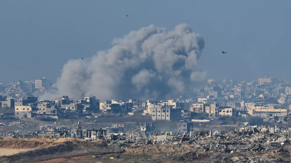 Smoke rises from an Israeli strike as the Israeli military conducts operations inside the Gaza Strip, amid the ongoing conflict between Israel and Hamas, as seen from southern Israel, January 1, 2025. REUTERS/Kai Pfaffenbach