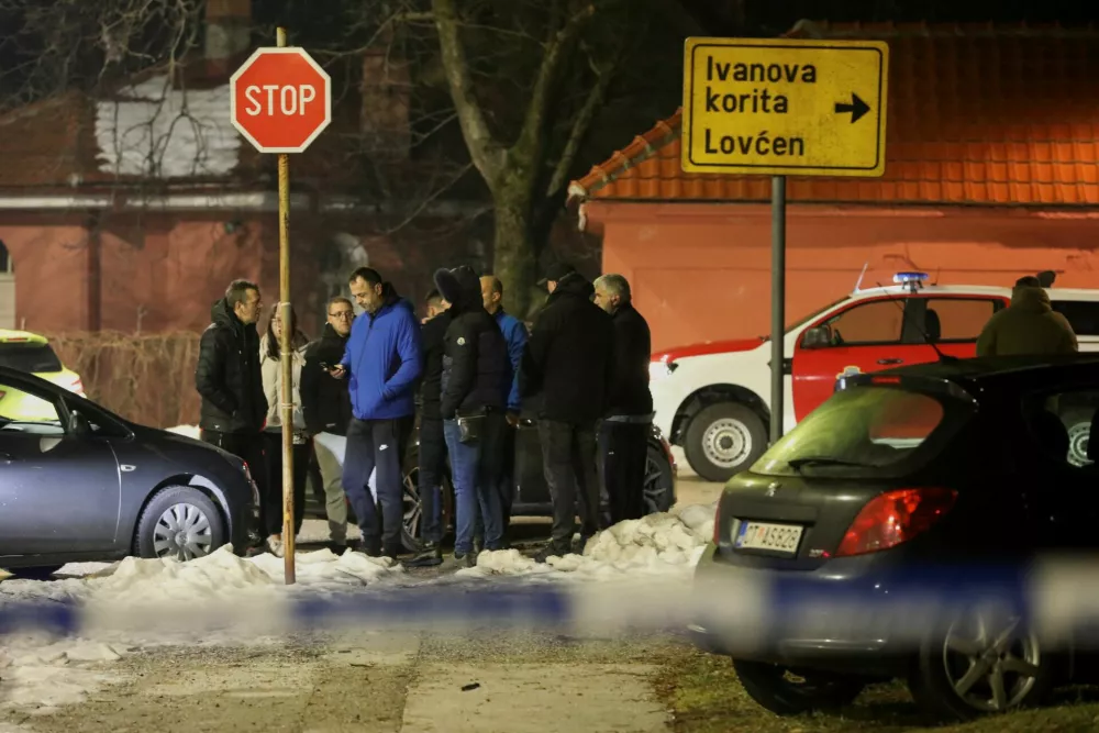 Police and security personnel stand near the scene where a gunman opened fire at a restaurant and killed several people in Cetinje, Montenegro, January 1, 2025. REUTERS/Stevo Vasiljevic