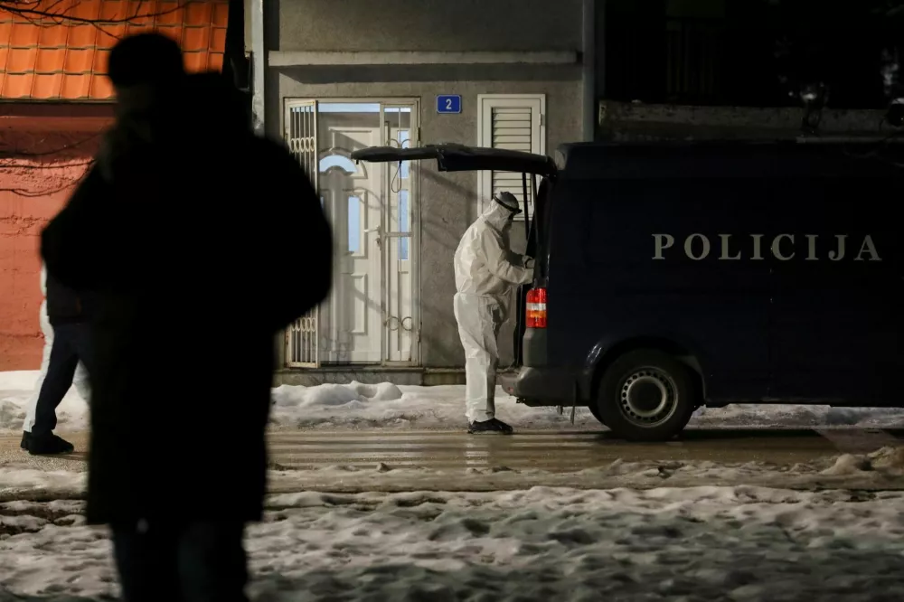 Forensics prepare to work at the scene where a gunman opened fire at a restaurant and killed several people in Cetinje, Montenegro, January 1, 2025. REUTERS/Stevo Vasiljevic