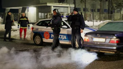 Police members stand on a checkpoint near where a gunman opened fire at a restaurant and killed several people in Cetinje, Montenegro, January 1, 2025. REUTERS/Stevo Vasiljevic