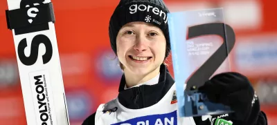 31 December 2024, Bavaria, Garmisch-Partenkirchen: Slovenia's Ski jumper Nika Prevc celebrates at the award ceremony after winning the women's large hill 2nd round of the ski jumping Two Nights Tour. Photo: Daniel Karmann/dpa