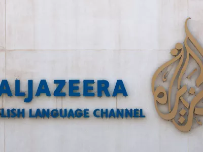 FILED - 05 June 2012, Qatar, Doha: The lettering and logo of the Arab news channel Al-Jazeera can be seen on the company's premises. The Palestinian Authority (PA) has suspended the Qatari-based Al Jazeera television news channel and its employees from operating in the Israeli-occupied West Bank. Photo: Tim Brakemeier/dpa