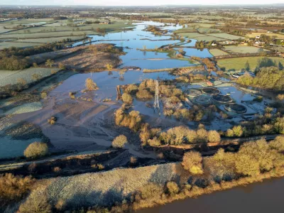 A drone view shows flooding and a land slip after part of the Bridgewater Canal embankment collapsed during heavy rain near Little Bollington, Britain, January 2, 2025. REUTERS/Phil Noble   TPX IMAGES OF THE DAY