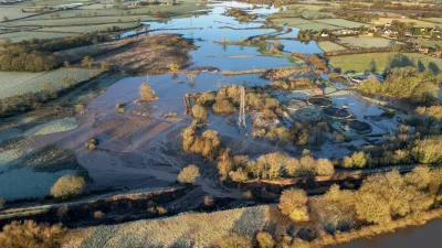 A drone view shows flooding and a land slip after part of the Bridgewater Canal embankment collapsed during heavy rain near Little Bollington, Britain, January 2, 2025. REUTERS/Phil Noble   TPX IMAGES OF THE DAY