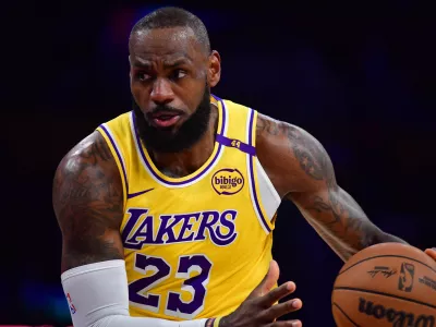 Dec 31, 2024; Los Angeles, California, USA; Los Angeles Lakers forward LeBron James (23) moves the ball against the Cleveland Cavaliers during the first half at Crypto.com Arena. Mandatory Credit: Gary A. Vasquez-Imagn Images