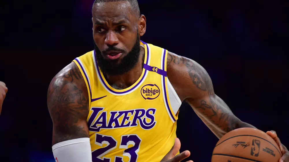 Dec 31, 2024; Los Angeles, California, USA; Los Angeles Lakers forward LeBron James (23) moves the ball against the Cleveland Cavaliers during the first half at Crypto.com Arena. Mandatory Credit: Gary A. Vasquez-Imagn Images