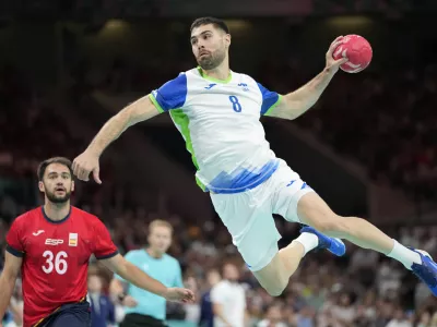 Slovenia's Blaz Janc is in action during the bronze medal handball match between Spain and Slovenia at the 2024 Summer Olympics, Sunday, Aug. 11, 2024, in Villeneuve-d'Ascq, France. (AP Photo/Brian Inganga)