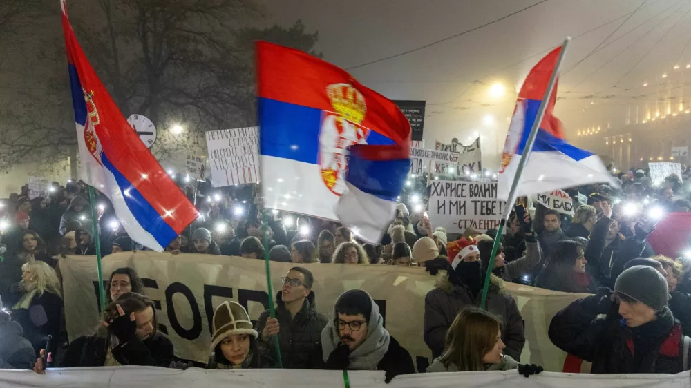 Students hold up their phones with flashlights during a New Year's Eve protest under the slogan 'There is no New Year - you still owe us for last one' organised against government policies and corruption, which they blame for the deaths of the victims in the Novi Sad railway station disaster in November, in Belgrade, Serbia, December 31, 2024. REUTERS/Djordje Kojadinovic