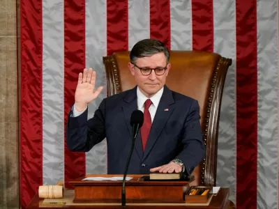 U.S. Representative Mike Johnson is sworn in as Speaker of the House after being re-elected, on the first day of the 119th Congress at the U.S. Capitol in Washington, U.S., January 3, 2025. REUTERS/Elizabeth Frantz    TPX IMAGES OF THE DAY