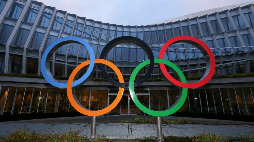 FILE PHOTO: The Olympic rings symbol is displayed at the Olympic House, ahead of the Executive Board meeting of the International Olympic Committee (IOC), in Lausanne, Switzerland, December 3, 2024. REUTERS/Denis Balibouse/File Photo