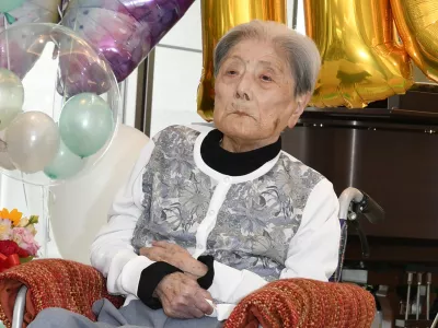 FILE - This photo provided by Ashiya City shows Tomiko Itooka, being celebrated for her 116th birthday at the nursing home she lives in Ashiya, western Japan, on May 23, 2024. (Ashiya City via AP, File)