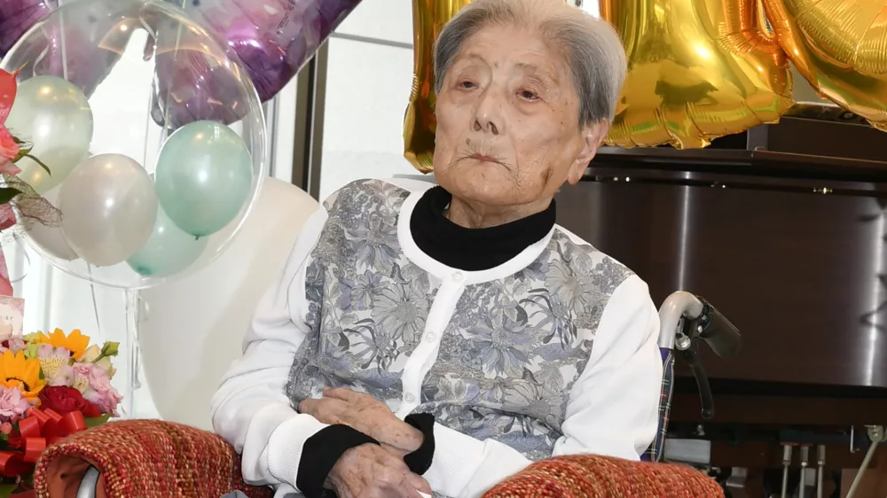 FILE - This photo provided by Ashiya City shows Tomiko Itooka, being celebrated for her 116th birthday at the nursing home she lives in Ashiya, western Japan, on May 23, 2024. (Ashiya City via AP, File)