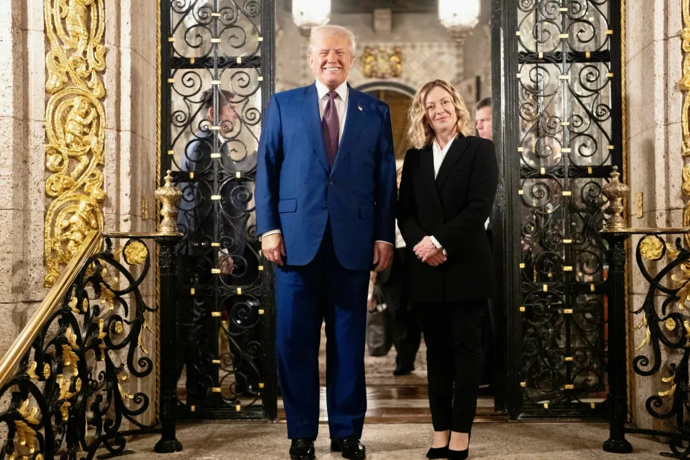 U.S. President-elect Donald Trump meets with Italian Prime Minister Giorgia Meloni at Mar-a-Lago in Palm Beach, Florida, U.S. January 4, 2025. Italian Government/Handout via REUTERS THIS IMAGE HAS BEEN SUPPLIED BY A THIRD PARTY. NO RESALES. NO ARCHIVES. MANDATORY CREDIT.