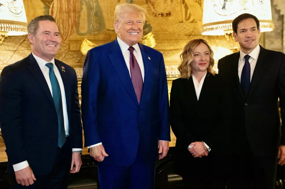 Italian Prime Minister Giorgia Meloni meets with U.S. President-elect Donald Trump, accompanied by U.S. Senator Marco Rubio (R-FL) and U.S. Representative Michael Waltz (R-FL) at Mar-a-Lago in Palm Beach, Florida, U.S. January 4, 2025. Italian Government/Handout via REUTERS THIS IMAGE HAS BEEN SUPPLIED BY A THIRD PARTY. NO RESALES. NO ARCHIVES. MANDATORY CREDIT.