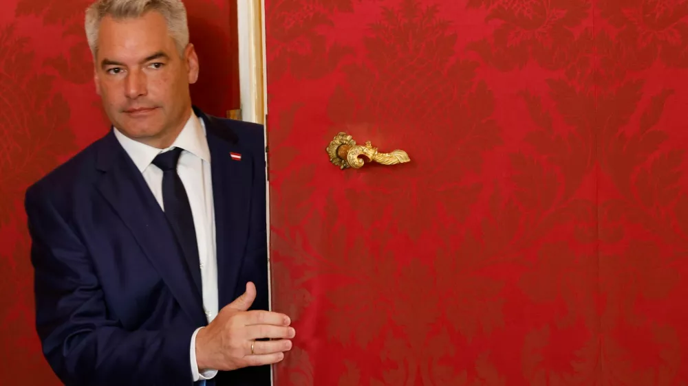 Austrian Chancellor and head of Peoples Party (OEVP) Karl Nehammer leaves a meeting with President Alexander Van der Bellen (not pictured) in Hofburg Palace in Vienna, Austria, October 21, 2024. REUTERS/Leonhard Foeger