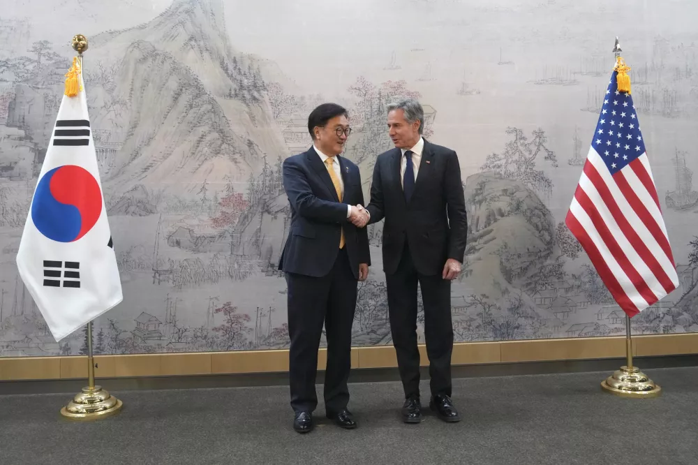 U.S. Secretary of State Antony Blinken, right, and South Korea's National Assembly Speaker Woo Won Shik, left, shake hands during a meeting at the National Assembly in Seoul, South Korea, Monday, Jan. 6, 2025.   Lee Jin-man/Pool via REUTERS