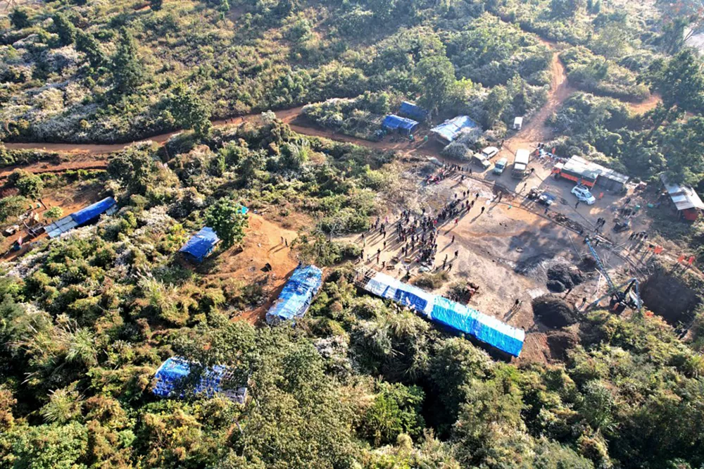 This image provided by Indian Army shows an aerial view of the site where at least nine workers are trapped inside a coal mine, in Umrangso area of Dimapur Hasao district in northeastern state of Assam, India, Tuesday, Jan. 7, 2025. (Indian Army via AP)