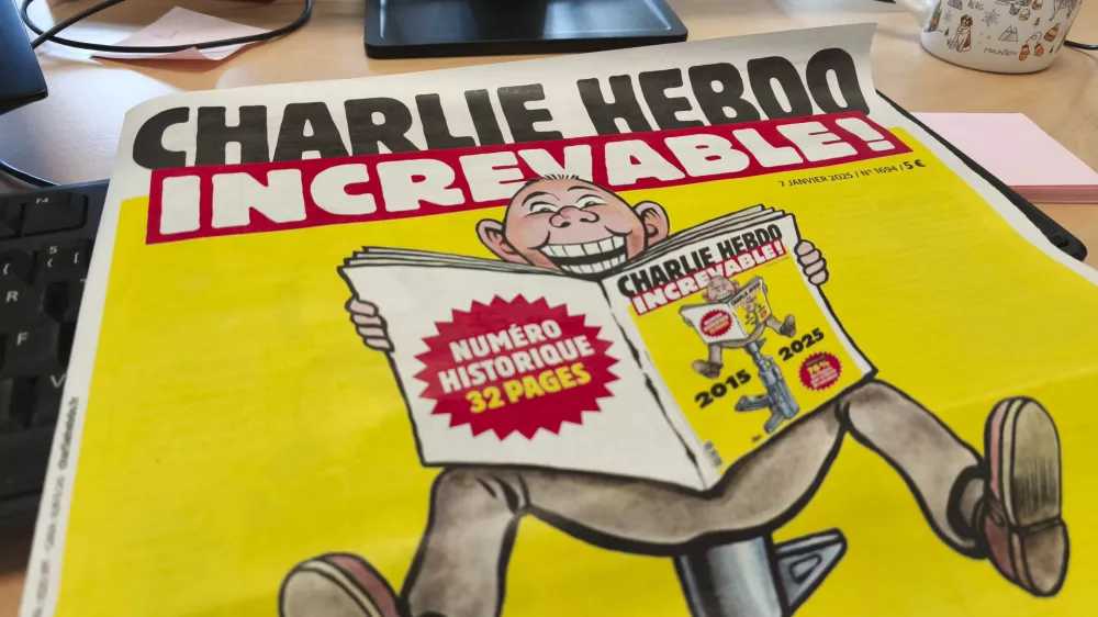 07 January 2025, France, Clermont-Ferrand: French satirical weekly Charlie Hebdo's frontpage on January 7, 2025, ten years after gunmen stormed satirical paper's offices, killing 11 people, over offensive cartoons of the prophet Muhammad. Photo: Adrien Fillon/ZUMA Press Wire/dpa