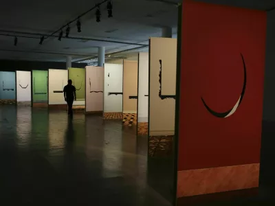 A man looks at an artwork by Walid Raad of Lebanon at the 31th Sao Paulo International Biennial, in Sao Paulo September 5, 2014. The title of the 31th Bienal is "How to talk about things that don't exist". The exhibition runs till December 7. REUTERS/Nacho Doce (BRAZIL - Tags: SOCIETY ENTERTAINMENT) - GM1EA9608ZV01