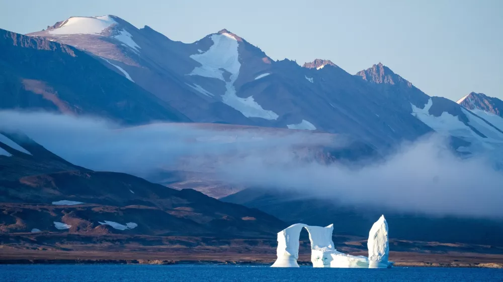 FILE - An iceberg floats in the Scoresby Sund, on Sept. 12, 2023, in Greenland. (AP Photo/Chris Szagola, File)