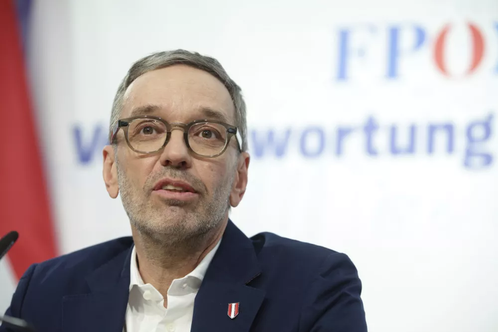 The leader of Austria's Freedom Party, Herbert Kickl, addresses a news conference, in Vienna, Austria, Tuesday, Jan 7, 2025. Herbert Kickl received a mandate Monday to try to form a new government. (AP Photo/Heinz-Peter Bader)