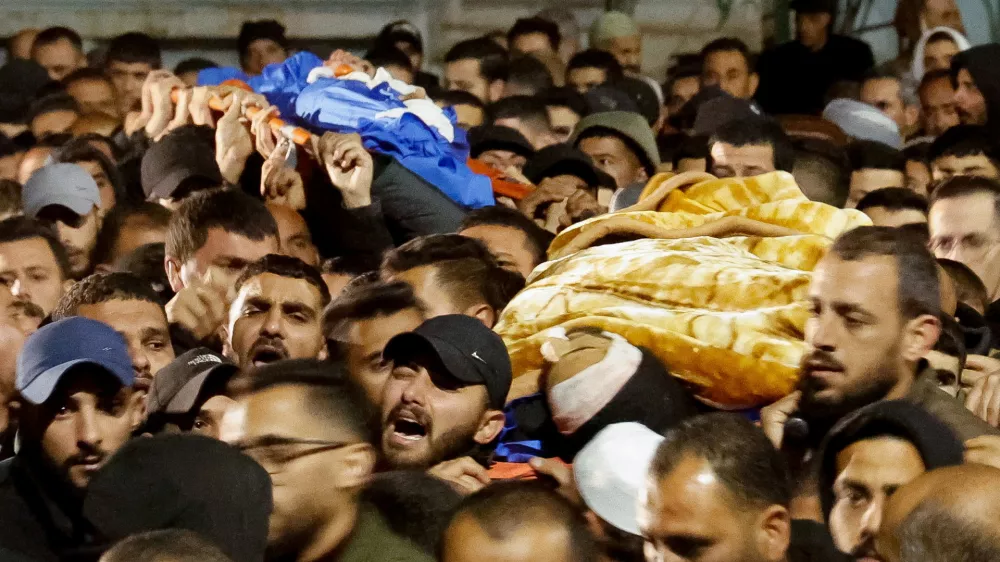  SENSITIVE MATERIAL. THIS IMAGE MAY OFFEND OR DISTURB  People carry the bodies of Palestinians killed in an Israeli drone strike, during their funeral in Tammoun near Tubas, Israeli-occupied West Bank, January 8, 2025. REUTERS/Raneen Sawafta