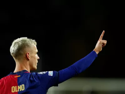 FILE PHOTO: Soccer Football - Champions League - FC Barcelona v Brest - Estadi Olimpic Lluis Companys, Barcelona, Spain - November 26, 2024 FC Barcelona's Dani Olmo celebrates scoring their second goal REUTERS/Albert Gea/File Photo