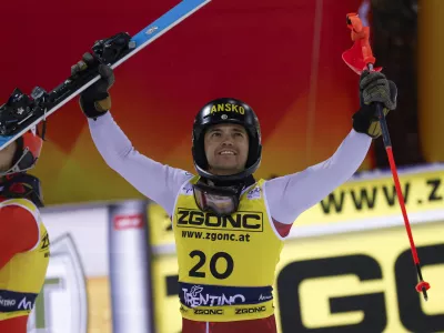 Bulgaria's Albert Popov celebrates winning an alpine ski, men's World Cup slalom in Madonna di Campiglio, Italy, Wednesday, Jan.8, 2025. (AP Photo/Alessandro Trovati)