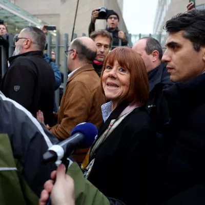 19 December 2024, France, Avignon: Gisele Pelicot (C) arrives with her lawyer Stephane Babonneau (R) at the courthouse in Avignon, where the verdict is expected in the trial against her ex-husband and 50 other defendants accused of drugging her and orchestrating several rapes over almost a decade. Photo: Clement Mahoudeau/AFP/dpa