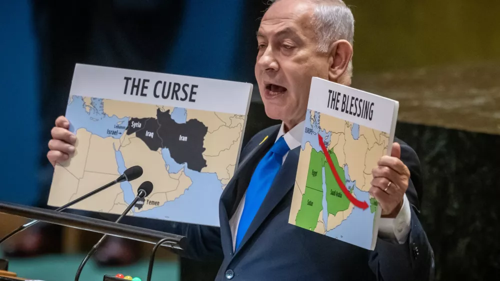 FILED - 27 September 2024, US, New York: Israel's Prime Minister, Benjamin Netanyahu, speaks during the 79th General Debate of the UN General Assembly and shows maps of the Middle East. Photo: Michael Kappeler/dpa