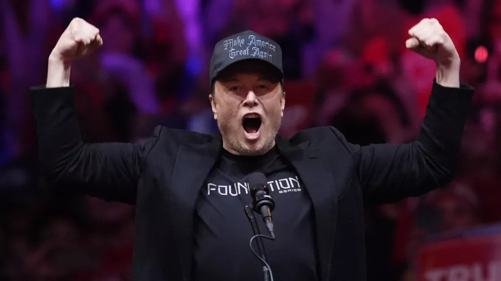 FILE - Elon Musk speaks before Republican presidential nominee former President Donald Trump at a campaign rally at Madison Square Garden on Oct. 27, 2024, in New York. (AP Photo/Evan Vucci, File)