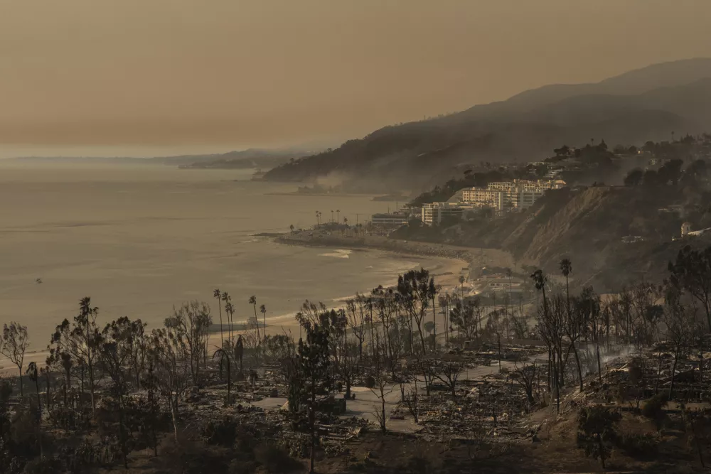 A mobile home community devastated by the Palisades Fire is seen in the Pacific Palisades neighborhood of Los Angeles, Thursday, Jan. 9, 2025. (AP Photo/Jae C. Hong)